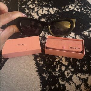 Miu Miu Black and Gold Sunglasses